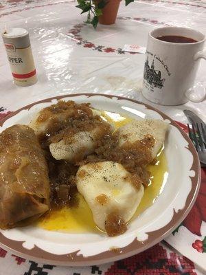 Cabbage roll, pierogi, and borscht.