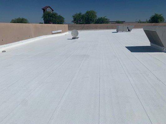 Mesa roof just coated with our Elastomeric White Coating.  30 dry mils will yield a 10 year performance.