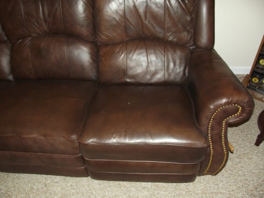 Faded and Discolored Couch After