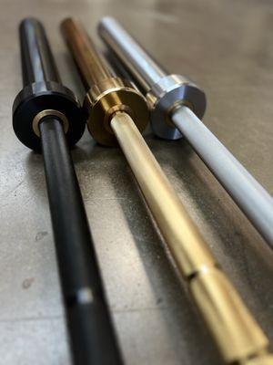 Revision Barbells offers a variety of affordable barbells - Signature barbells include Chrome, Black Chrome and Gold