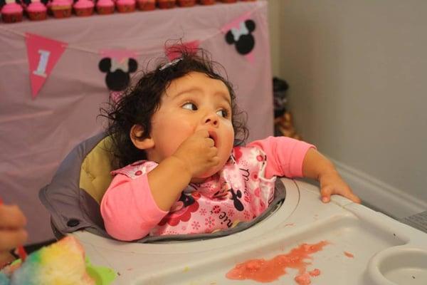 My one year old daughter enjoying her treat on her special day!