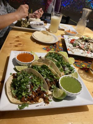 Chorizo taco, chicken taco, steak taco and carnitas taco