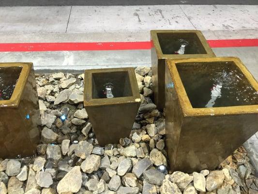 The fountains at a fancy 76 gas station