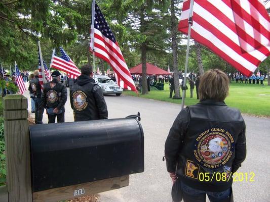 Patriot Guard at attention during funeral.