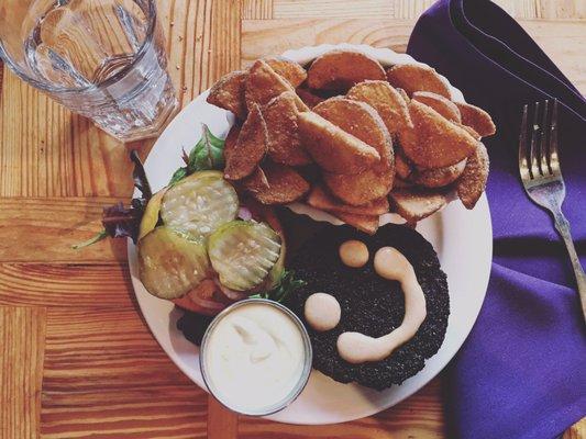 The burger on the menu. The patty was slightly burnt but not enough to complain. The star was the extra potatoes and the sauce.