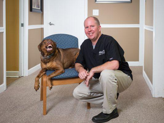 Dr. Wimer and one of his dogs Abel.