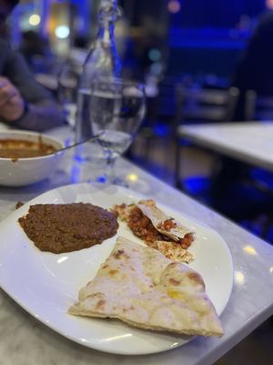 Dal Makhni with butter naan along with masala papadum