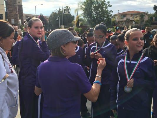 Coach Linda with a little pep talk after another 1st place win @Synchrodemayo