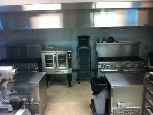 convection oven and two 10 burner ranges, commercial kitchen and catering.