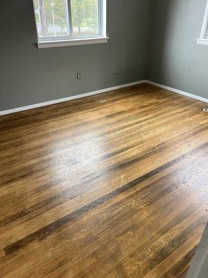 Damaged the floor with Black stain all around