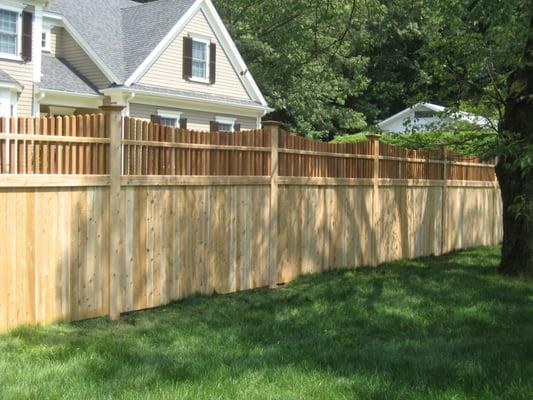 6' high scalloped spoke top cedar fence