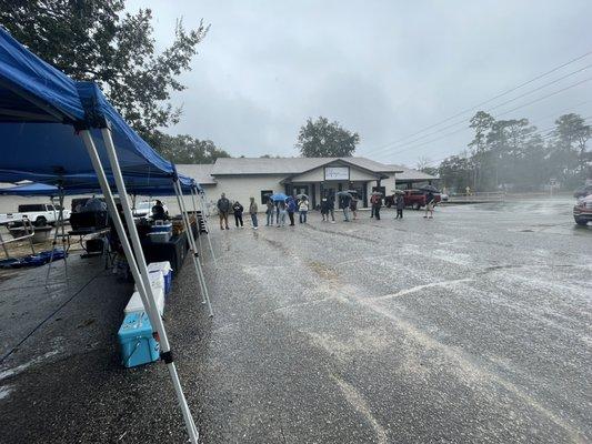 Customers literally getting drenched standing in the rain to order barbecue! If that doesn't speak to what we offer, I don't know what will!