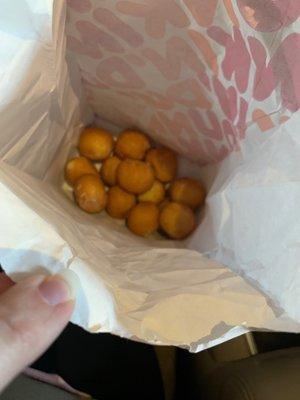 I ordered and paid for 25 munchkins and only received 13 cold, stale half glazed munchkins.