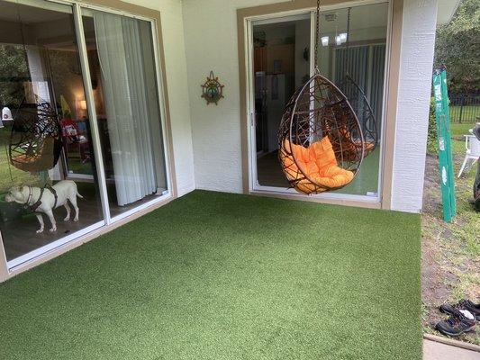 Indoor outdoor carpet installation Hanging egg chair.