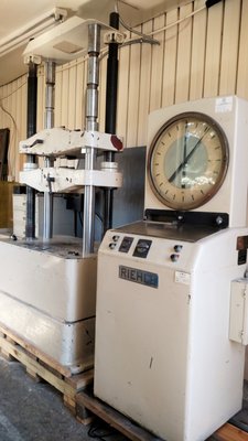 Buster the tensile machine has a 120,000lb. testing capacity! Shown with antique dial, he has since been upgraded to digital.