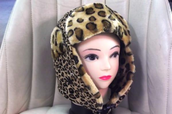 Faux fur Trapper hat in assorted leopard prints.