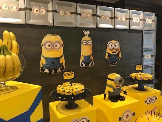 Custom boxes that she painted yellow and have the eyes of the minions