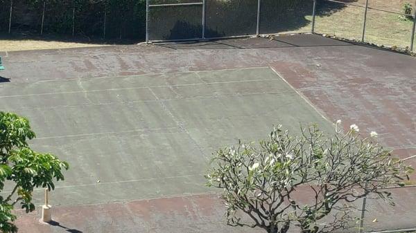 One of the tennis courts rarely every used for tennis.