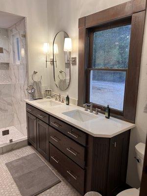 New vanity sinks and faucets complete the bathroom remodel