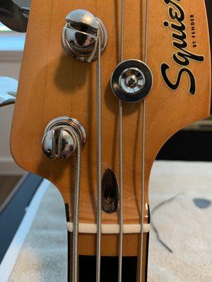 New truss rod nut and walnut plug.