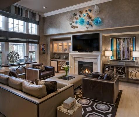 The Contemporary Design of this Palo Alto Pied-à-terre features glass wall art, custom fireplace design, and furnishings by Swaim Furniture.