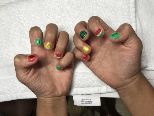 My daughter's gel nail job. Check out all the fancy things Vicky can do. Yep, she actually drew the watermelon!