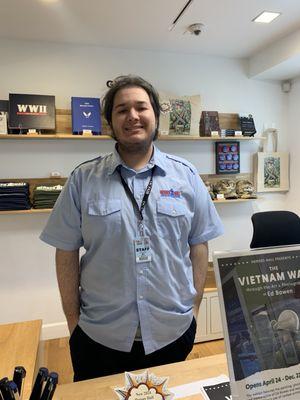 Here's Eli the friendly staffer, who rang me up and presented us with I am a Veteran badges.