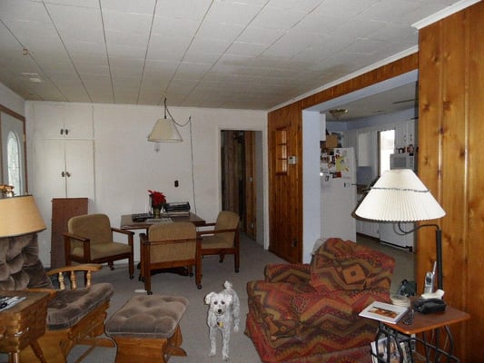 Home owner had a long narrow living room and dining room.