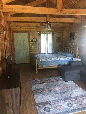 Main room with queen bed with new memory foam mattress