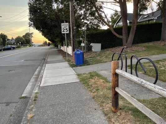 Bike rack and trash cans. No restrooms or water.