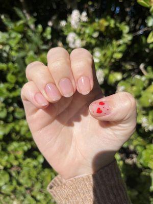 light pink gel manicure with hearts for valentine's day!