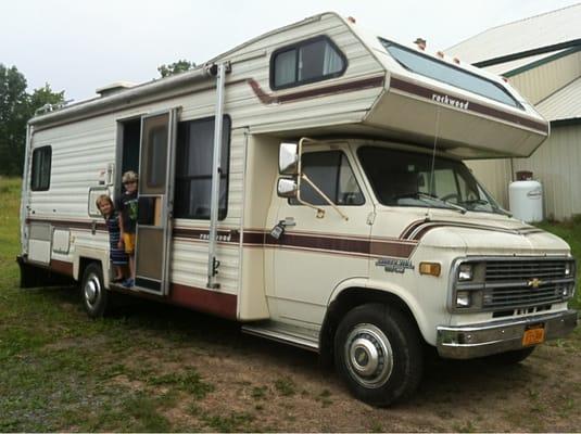 Outside of Clark's with our new RV!