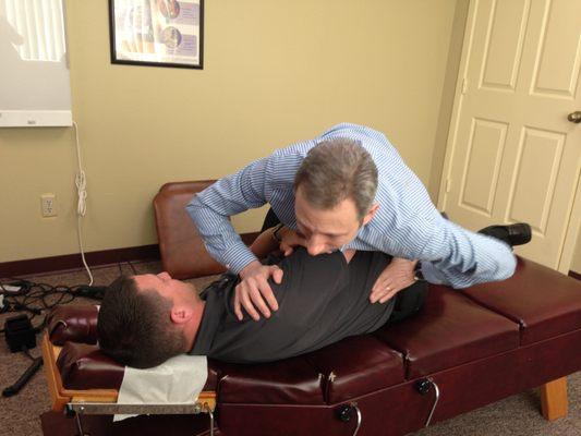 Dr. Basile performing low back spinal adjustment