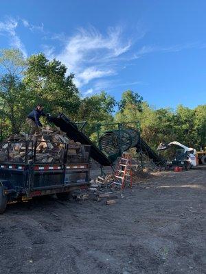 THE WOOD IS GOING THROUGH THE TUMBLER TO HELP GET RID OF DEBRIS.