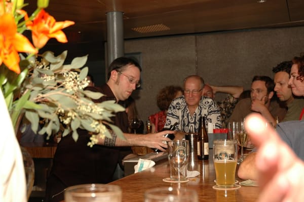 Carlos tending bar at the Grand Opening