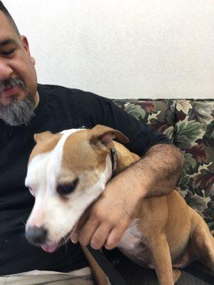 Xochitl and her daddy waiting for the Doctor.