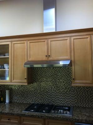 MAPLE CABINETS. 1/2 MOSAIC TILE