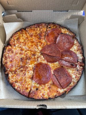 Half cheese half pepperoni pizza