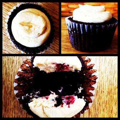 Chocolate cupcake filled with black raspberry jam, topped with peanut butter buttercream