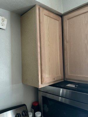 Cabinets are not flush with the wall or each other