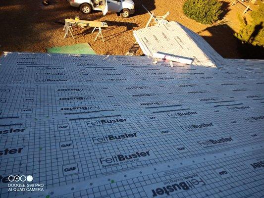 During asphalt to metal roof transformation