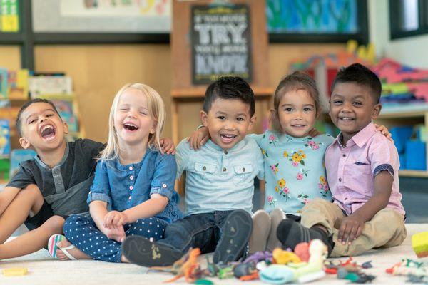 Montessori children laughing