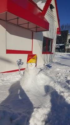 Two feet of snow doesn't keep them from cooking or having a little fun!