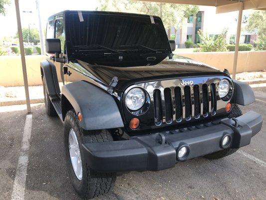 Completed windshield replacement on a Jeep Wrangler