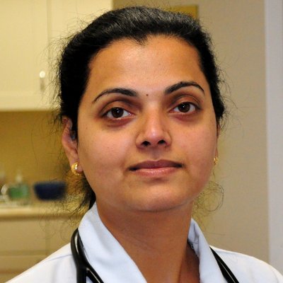 Mukta Sharma, MD Board Certified in Internal Medicine and Rheumatology