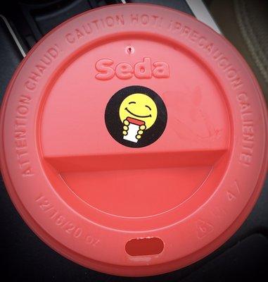 A cheery sticker on every cup.