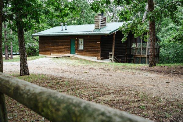 YMCA Trout Lodge exterior of forest view cabin