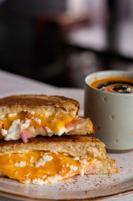 Gourmet Grilled Cheese | sourdough bread, cheddar cheese, swiss cheese, goat cheese, aioli, pickled onions