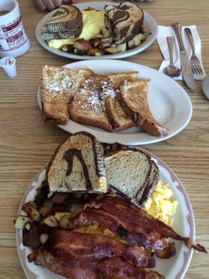 Farmers omelet and eggs w/ bacon and red potato home fries. French toast in the middle. Outstanding!