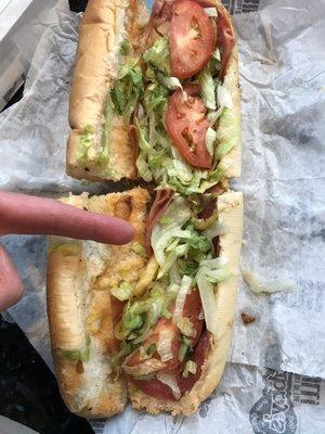 Large classic Italian on everything bread, only given 3 half slices of tomato for my large sub. This place is cheap with toppings-unreal!